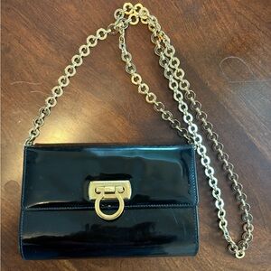 Salvatore Ferragamo Glossy Black Crossbody with Gold Accents